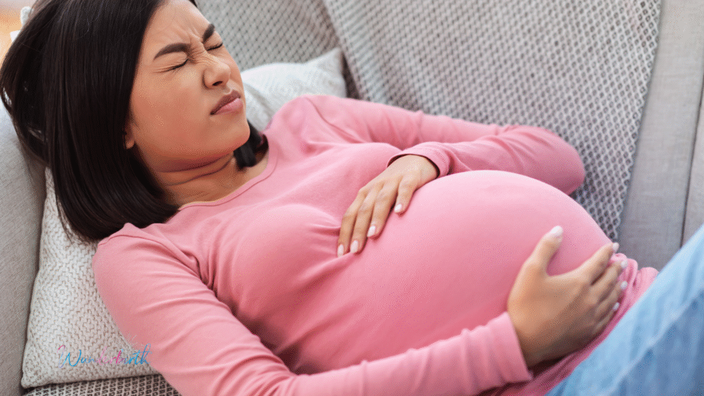 A pregnant woman in her last term trying to figure out if she is experiencing false labor vs. true labor signs.