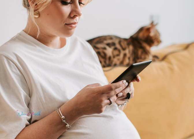 A pregnant mother reviewing her checklist for a birthing center.