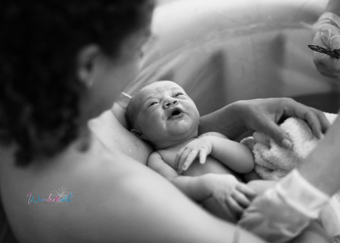 A beautiful scene of the first moments of a child's life after a home birth.